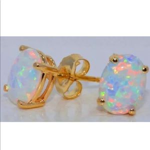 8x6mm opal stud earrings 14kt yellow gold